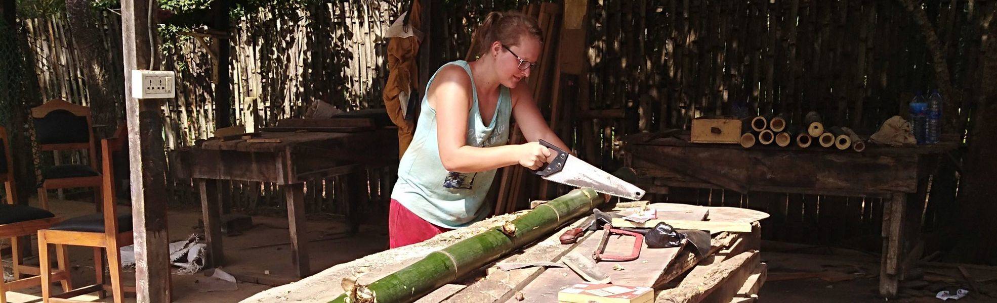 Volunteer at her voluntary work as a carpenter