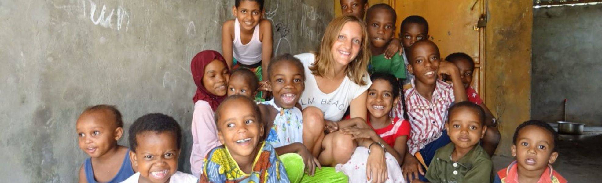 Volunteer is doing her internship abroad in Africa with children