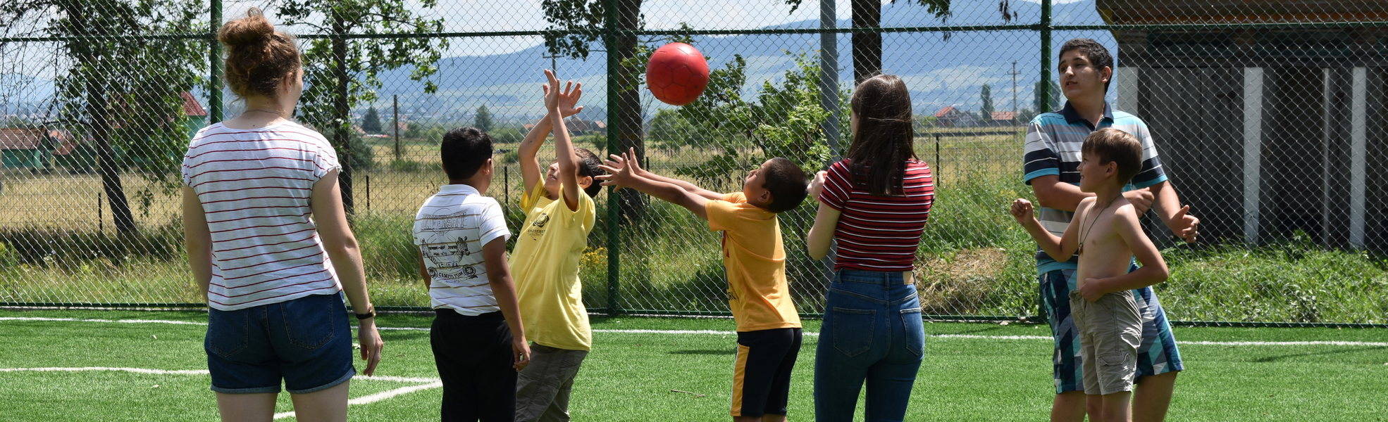 Children play in volunteer project in Romania