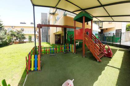 Playground behind the kindergarten building