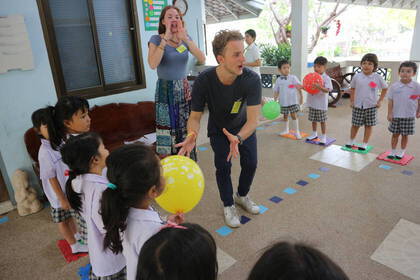 Learning English while playing in a Thai kindergarten
