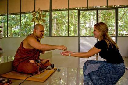 Volunteer spends time with Buddhist monk
