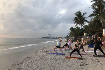 Yoga session on the beach