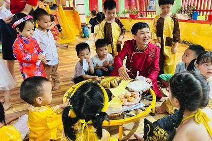 The leader spends time with the children