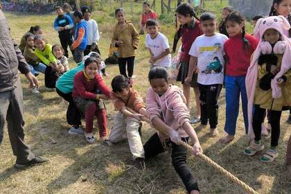 Children playing tug of war