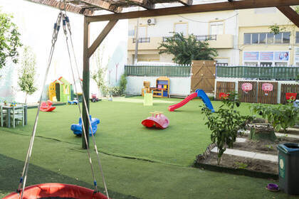 Outdoor area with slides and toys