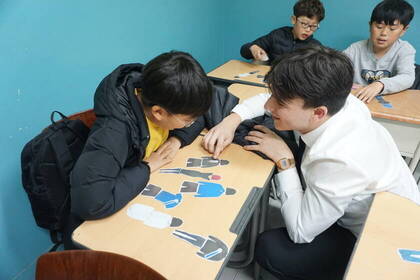 Volunteer unterrichtet