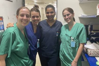 Gruppenfoto Volunteers und Mitarbeiterinnen