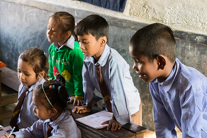 Children teach at a village school in Nepal, Chitwan